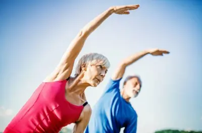 Man and woman stretching