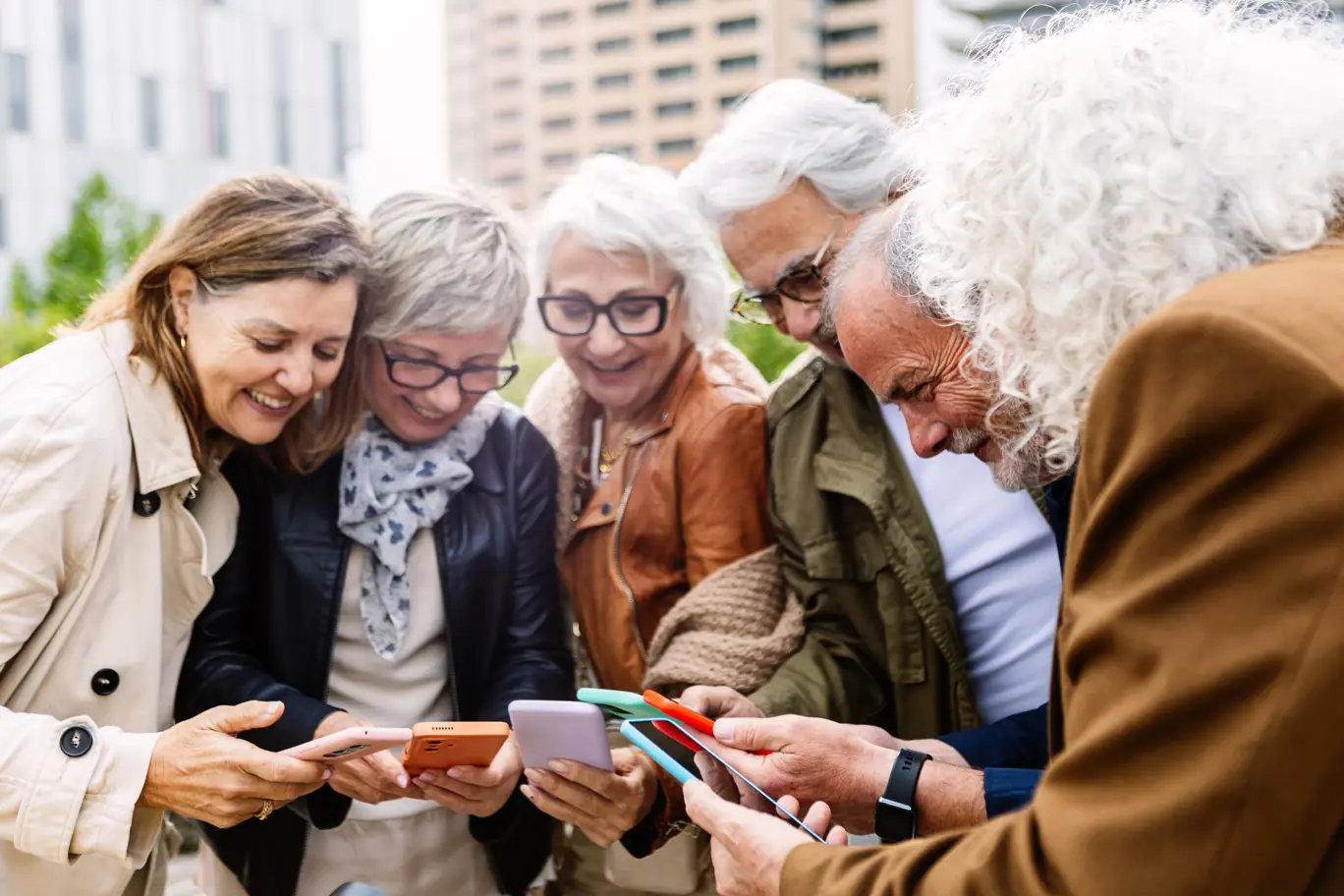 Group of woman looking at there phones
