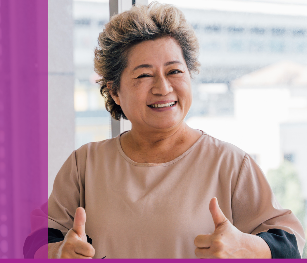 woman giving thumbs up with both hands