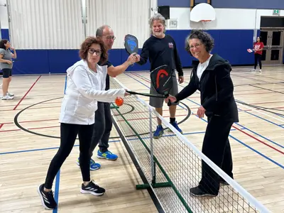 Image of group playing pickle ball