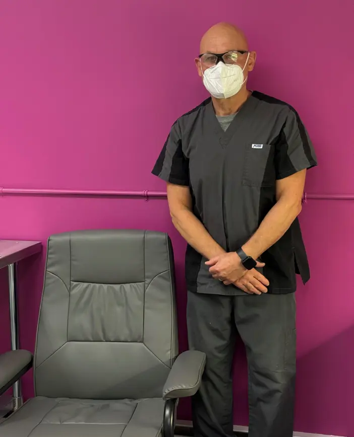 Foot Care nurse Al standing in footcare room at John Street