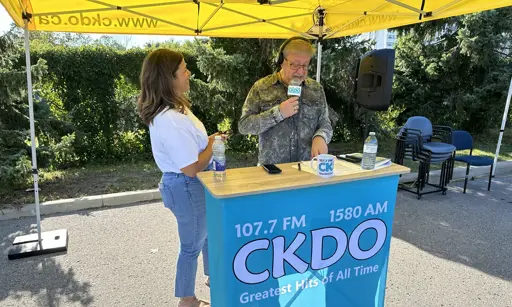 Staff giving information at an event