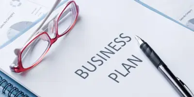 Business plan with glasses