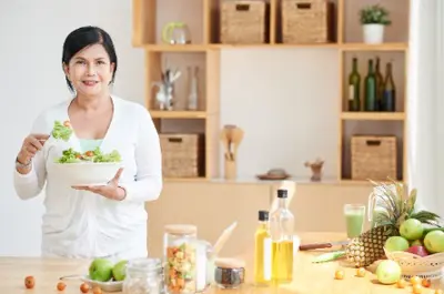 Woman eating salad