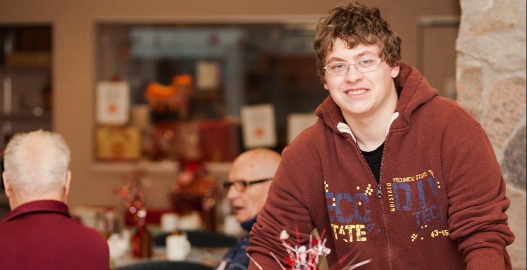 Student volunteering in the cafeteria