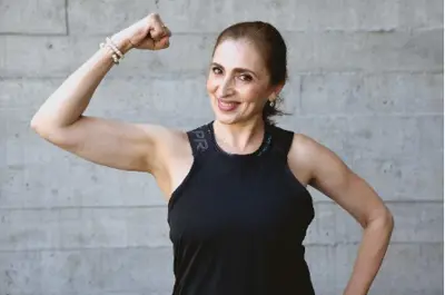 Woman flexing bicep
